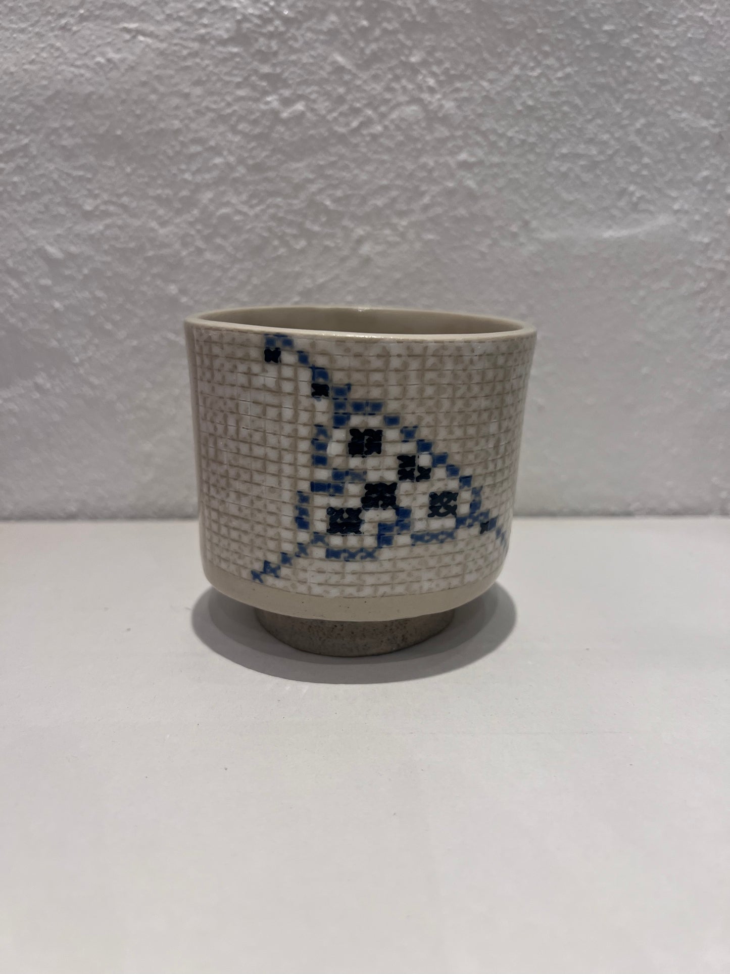 Korsstingskop med hank